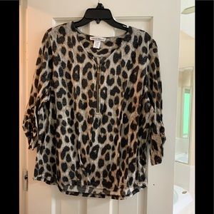 90% polyester with stretch. Love this top with a skirt or jeans